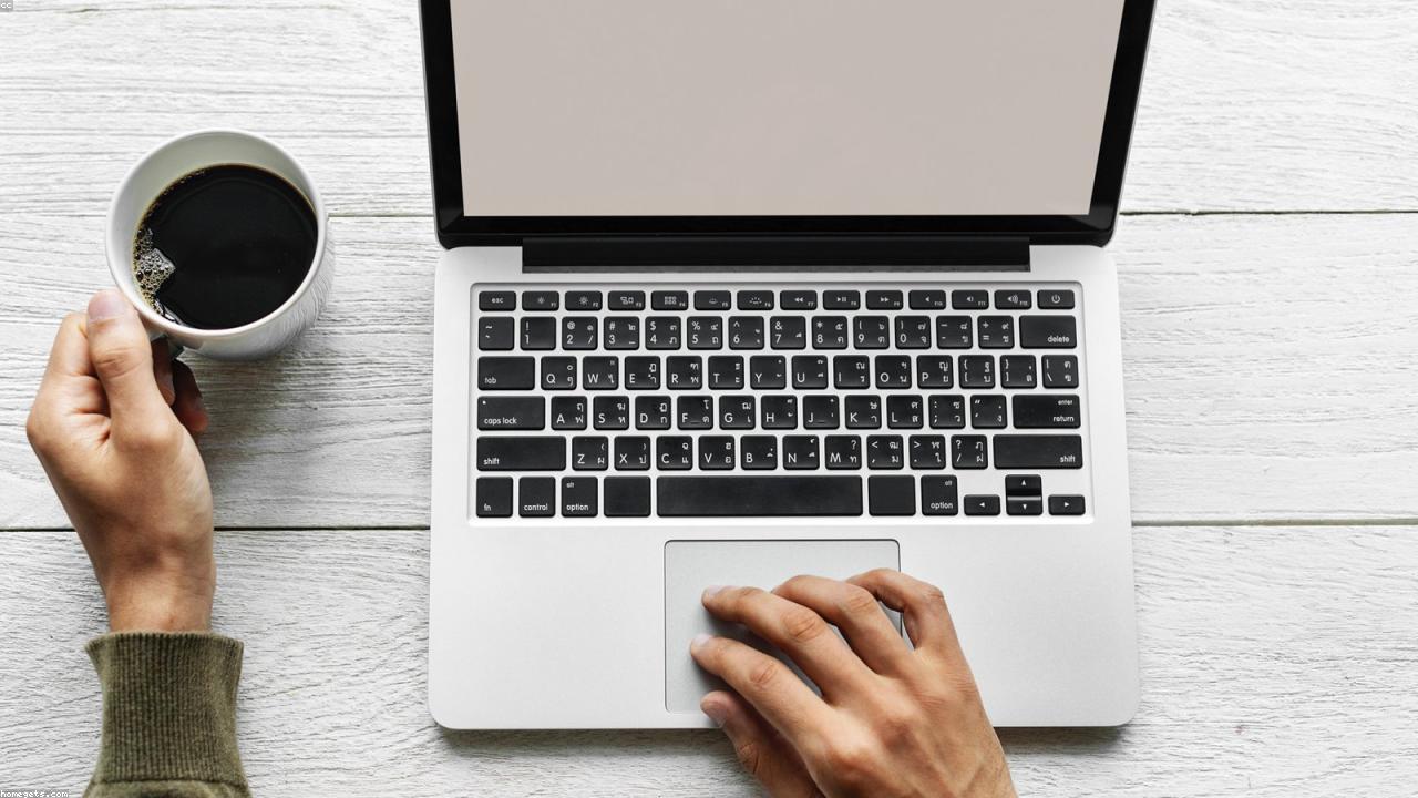 Inline editorial image showing an office collaboration setting.